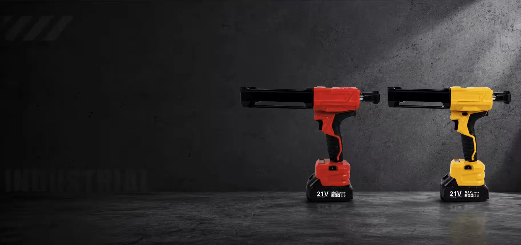 Red and yellow 21V cordless caulking guns for sealant dispensing on industrial concrete background