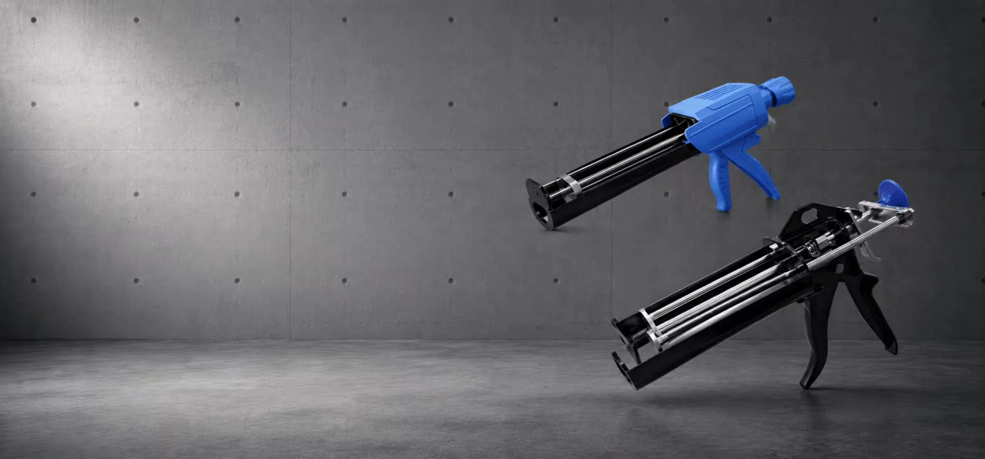 Professional dual cartridge caulking guns for two-component adhesive and sealant dispensing on an industrial background