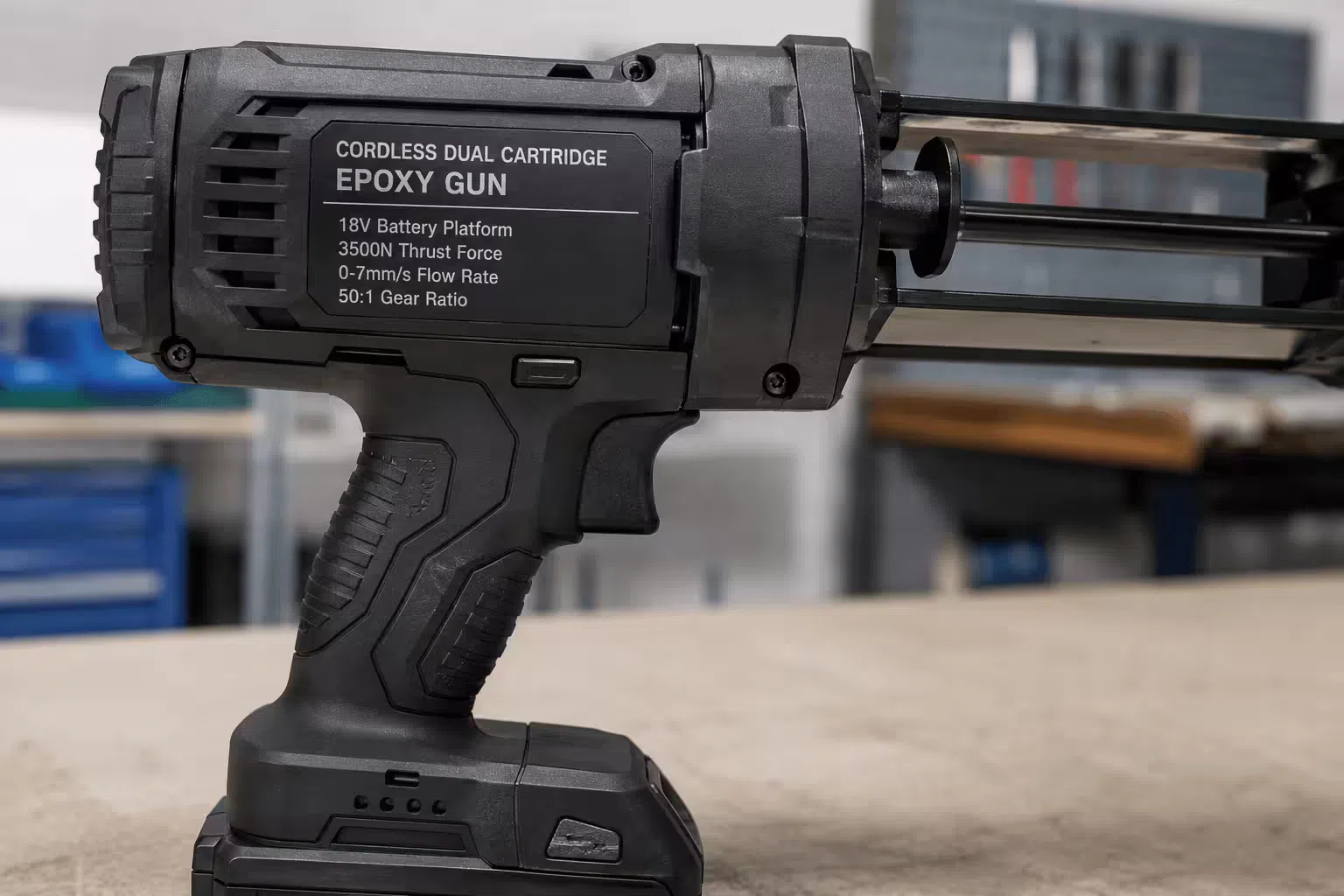 Battery voltage and thrust force specifications displayed on a cordless epoxy gun label showing 18V and 3500N ratings